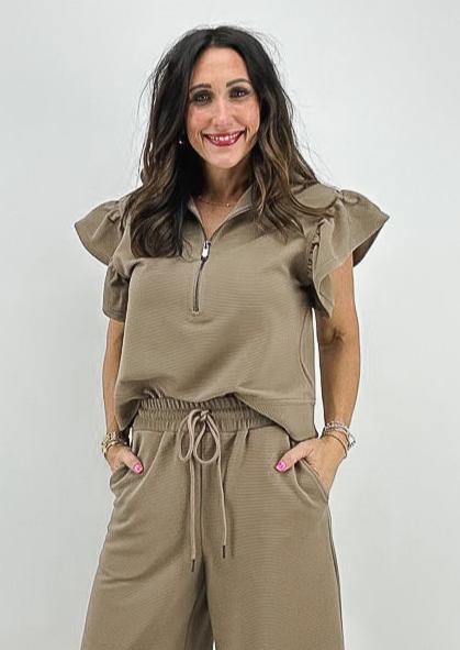 womens mocha brown half zip top with short ruffle sleeves and thick hem