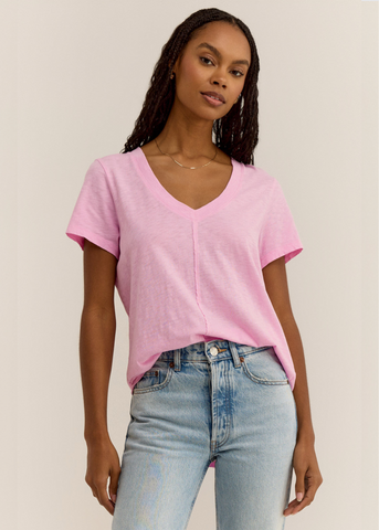 bright pink heather short sleeve v neck tee with seam down front of shirt 
